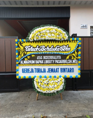 Papan Bunga Duka di Garoga